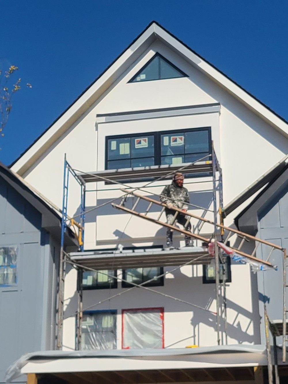 white house with scafolding